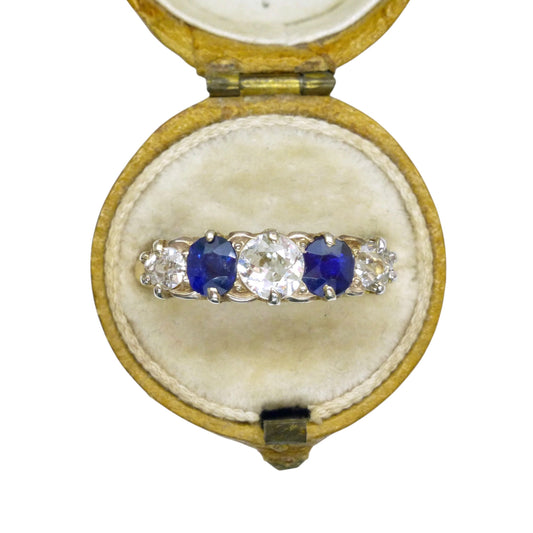 Antique sapphire and diamond five stone ring in an antique ring box