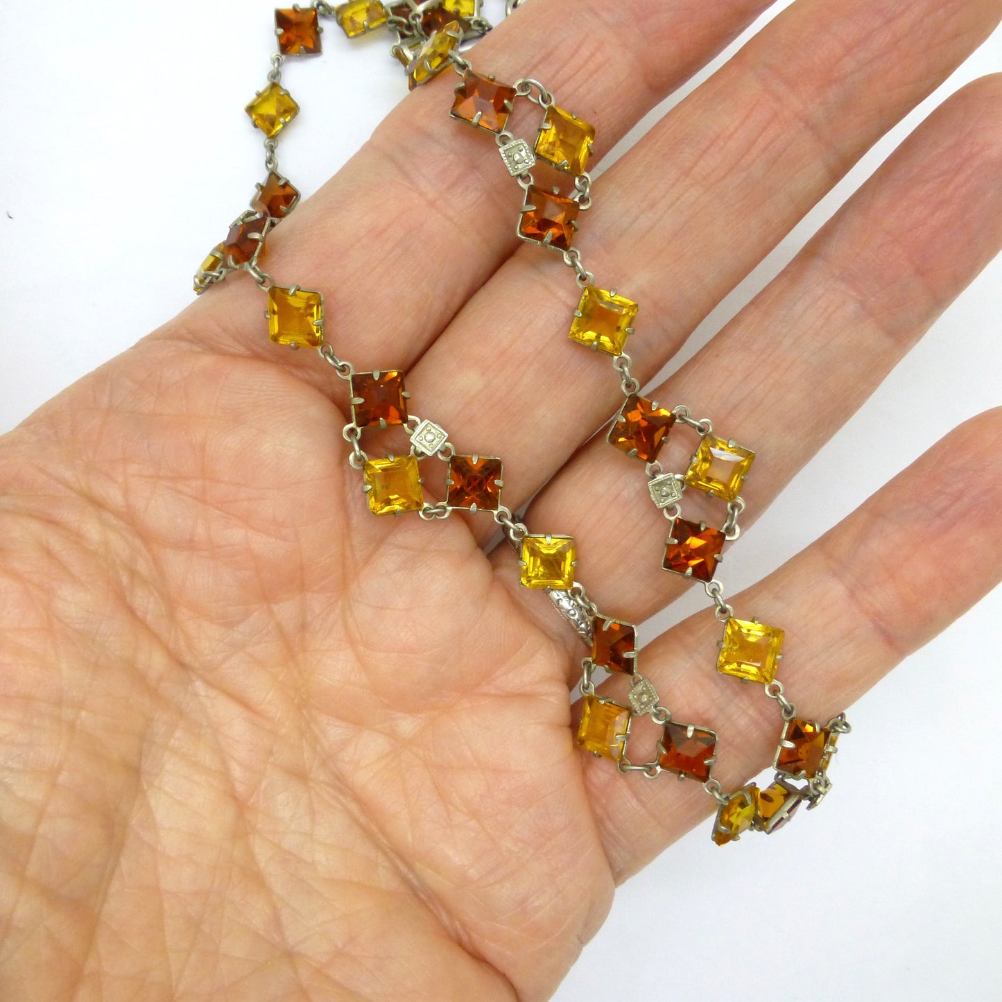 Art Deco amber glass open back rivière necklace c1920's