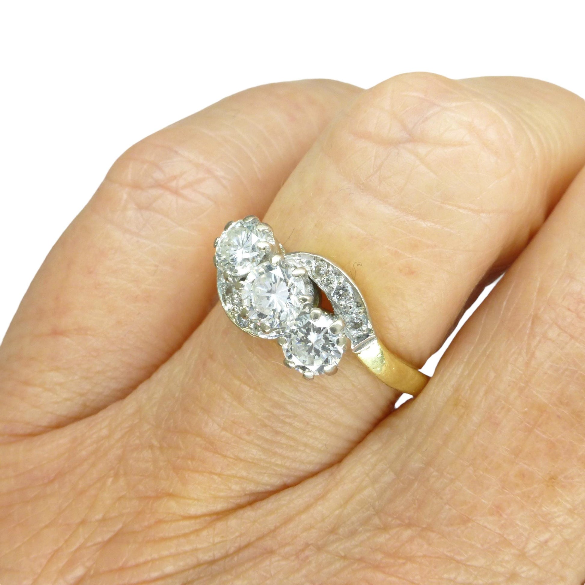 Vintage 18ct natural diamond three stone trilogy twist ring + Independent valuation report