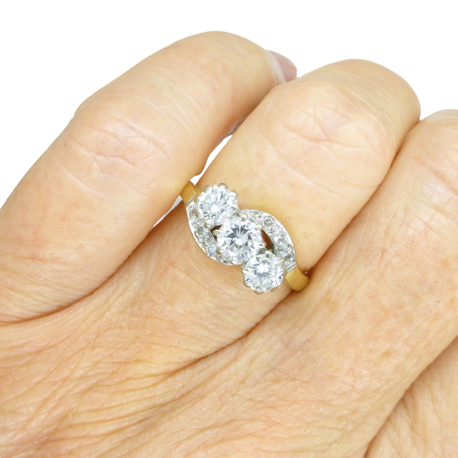 Vintage 18ct natural diamond three stone trilogy twist ring + Independent valuation report