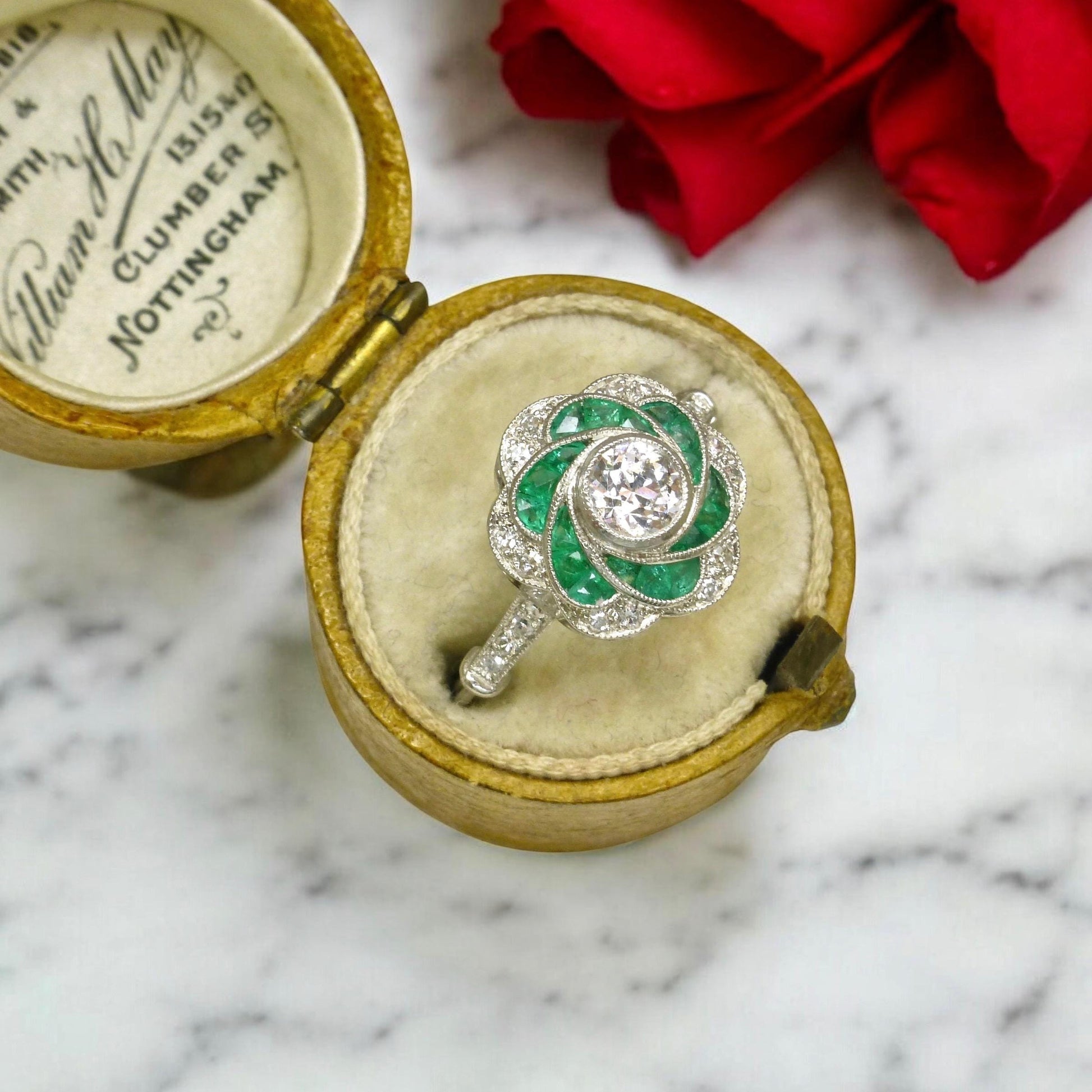 Art Deco style Platinum Emerald & Diamond flower cluster halo ring