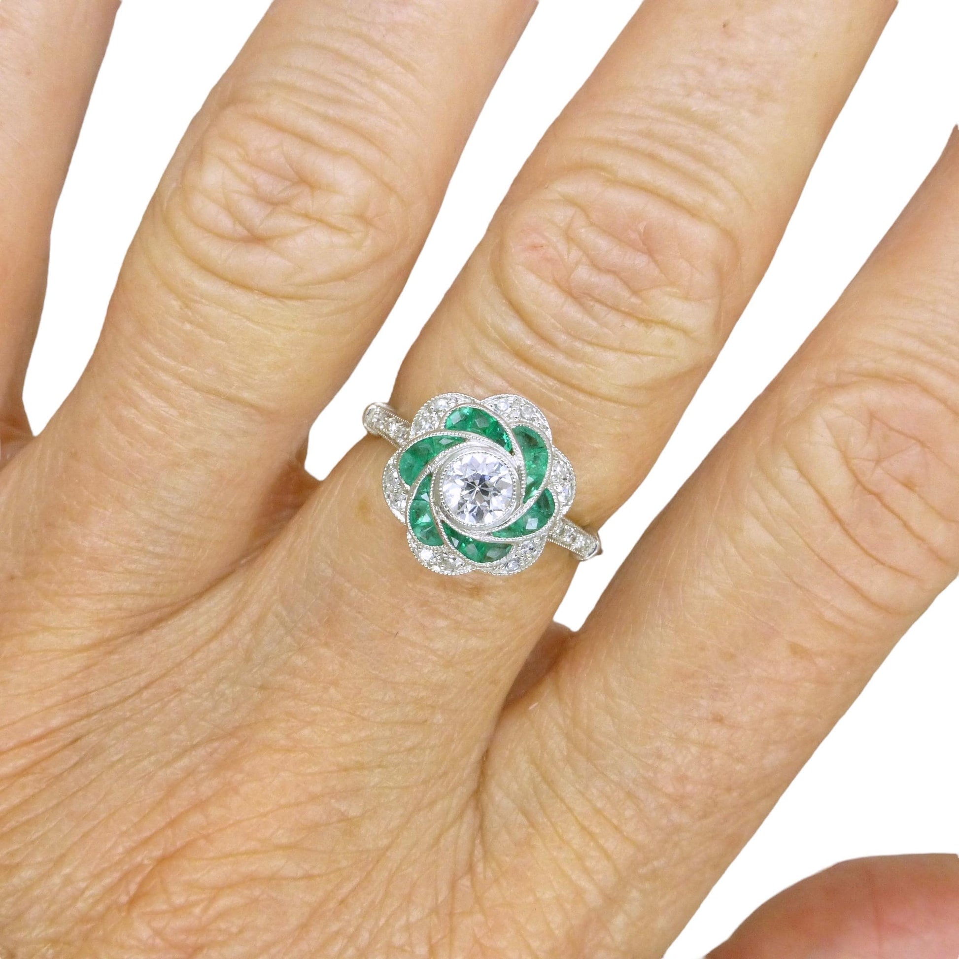 Art Deco style Platinum Emerald & Diamond flower cluster halo ring