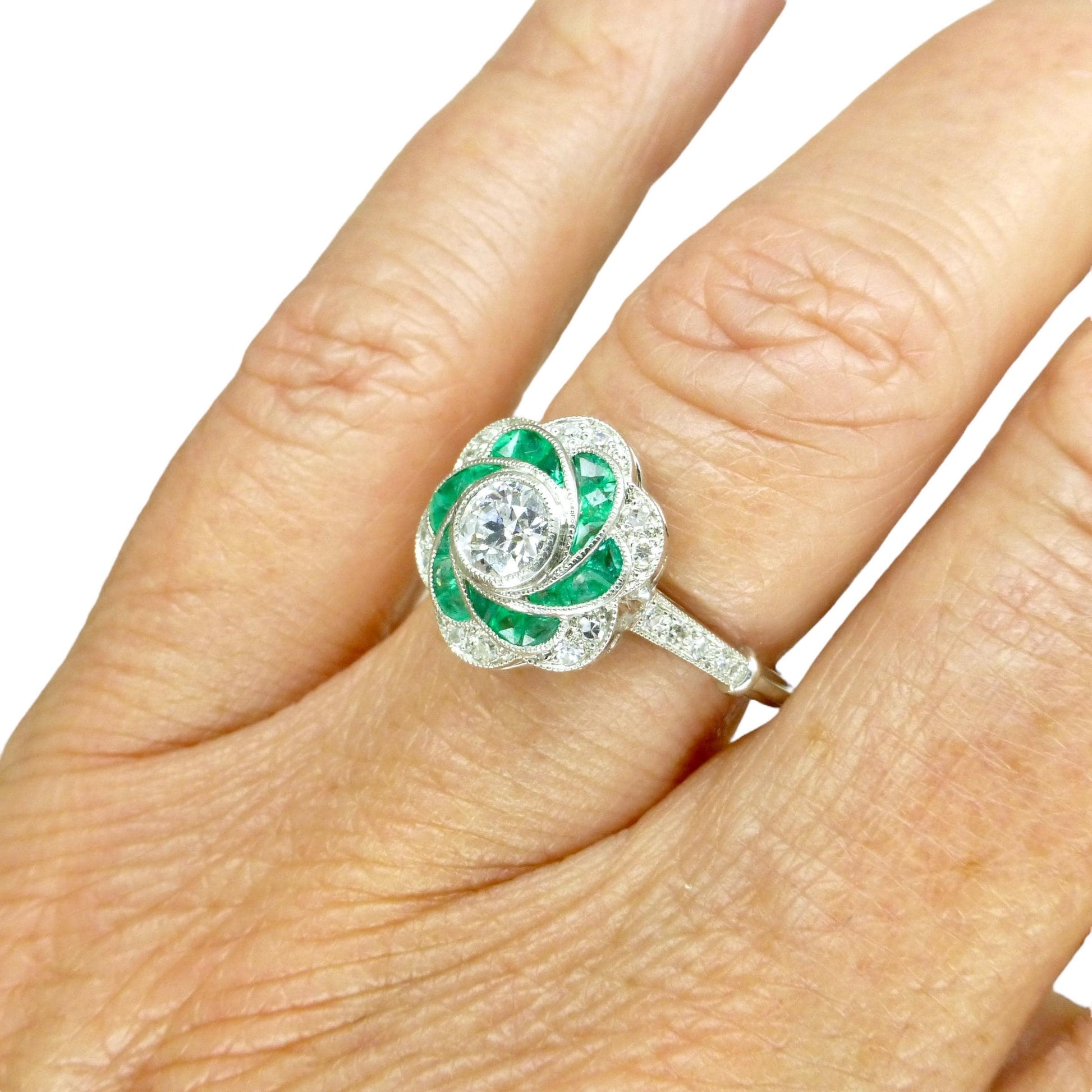Art Deco style Platinum Emerald & Diamond flower cluster halo ring