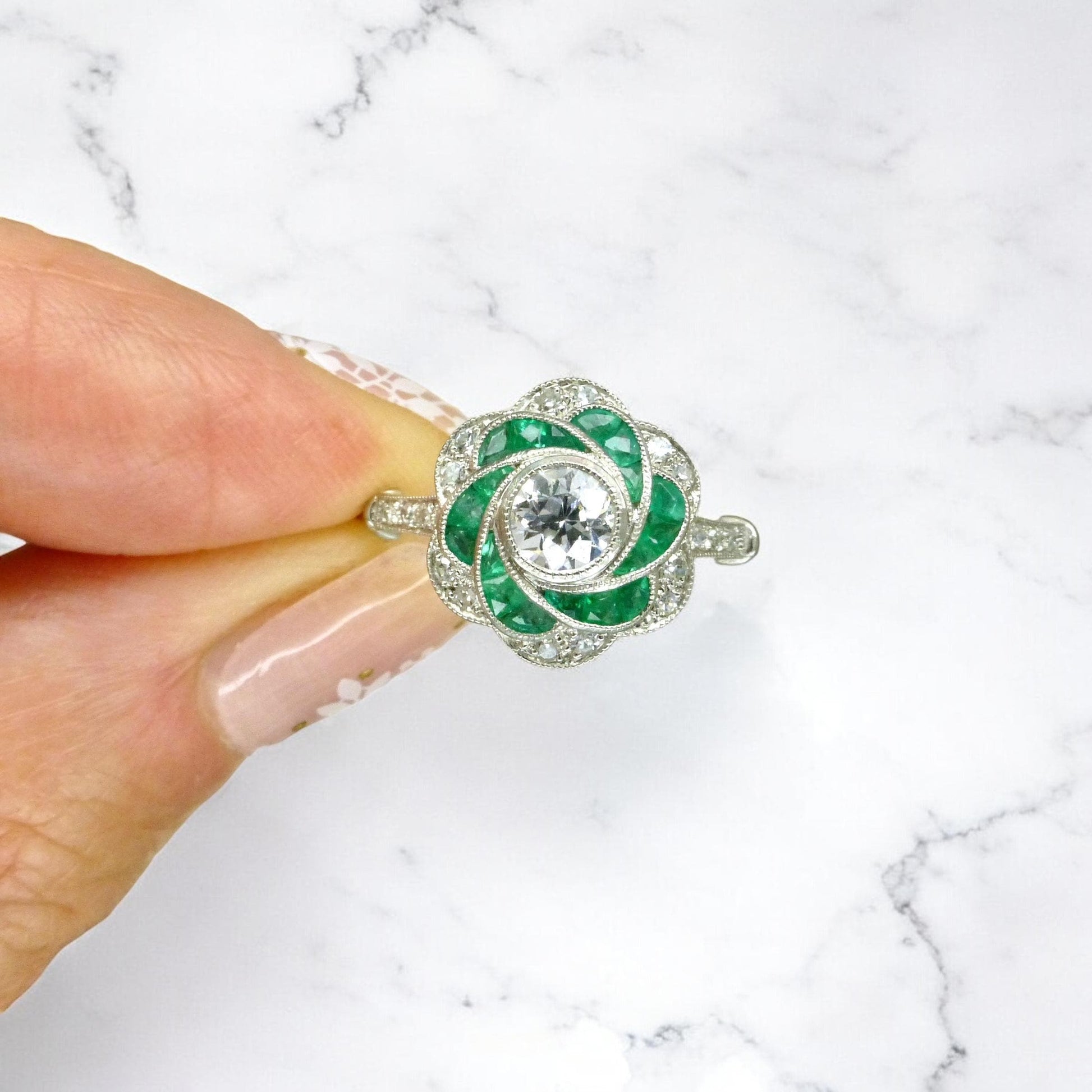 Art Deco style Platinum Emerald & Diamond flower cluster halo ring