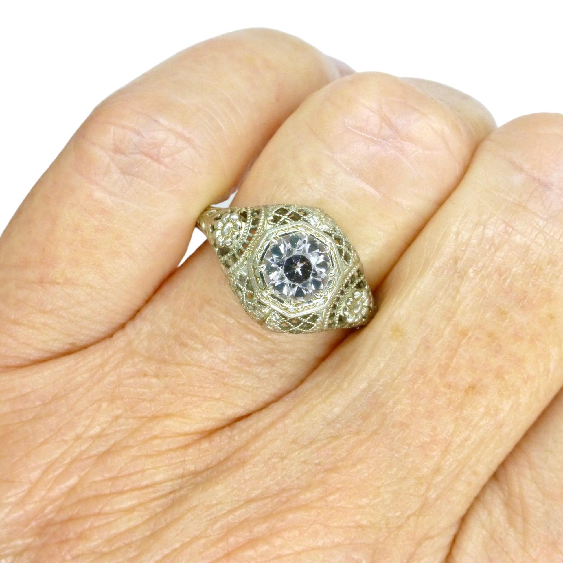 Antique white gold filigree and white sapphire solitaire ring c1900's