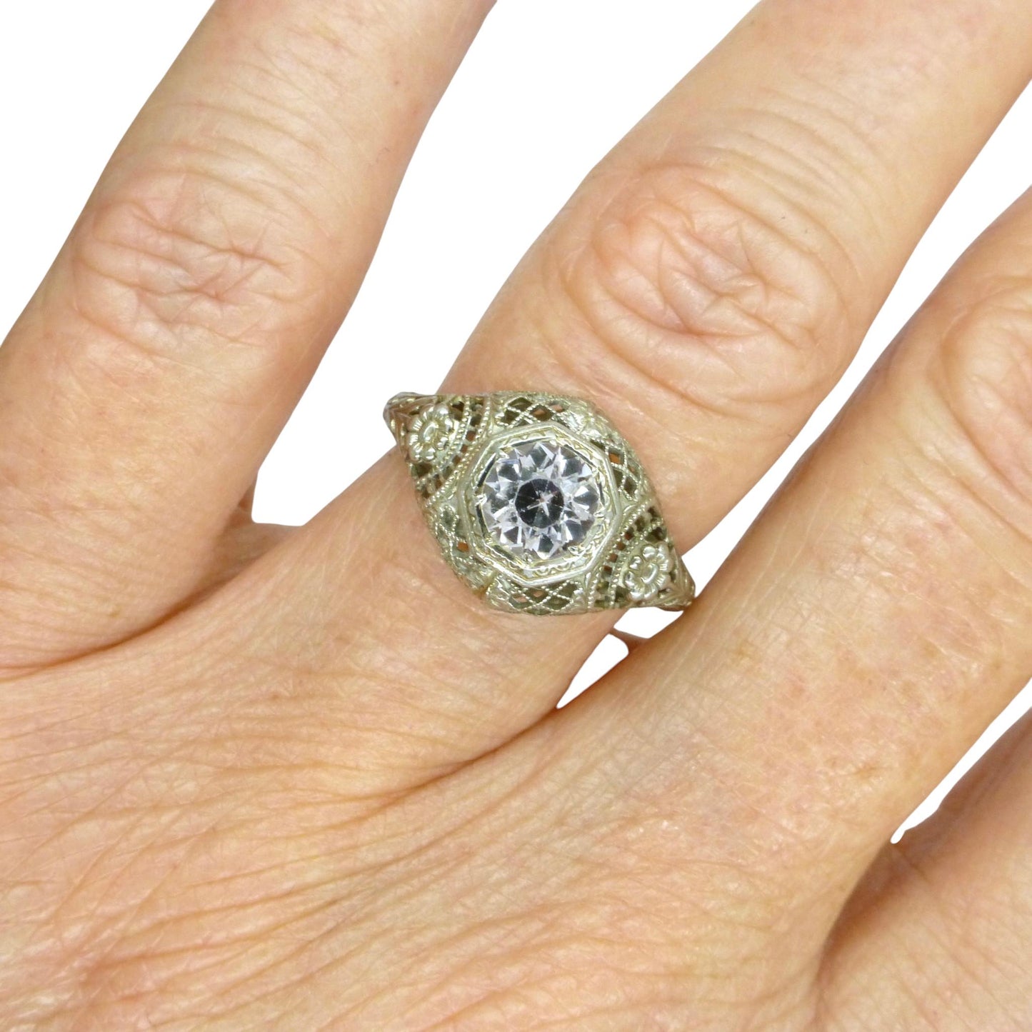 Antique white gold filigree and white sapphire solitaire ring c1900's