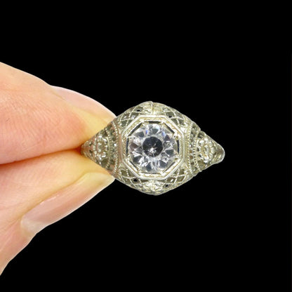 Antique white gold filigree and white sapphire solitaire ring c1900's