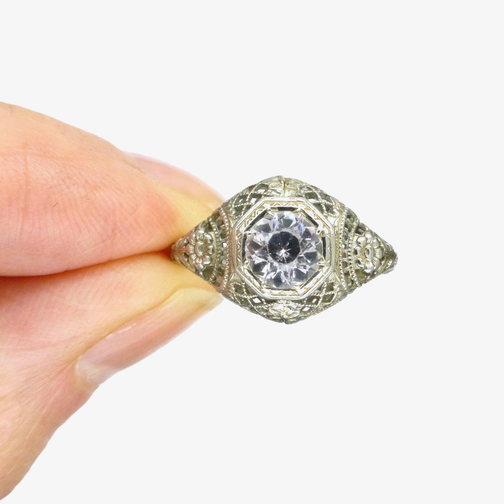 Antique white gold filigree and white sapphire solitaire ring c1900's