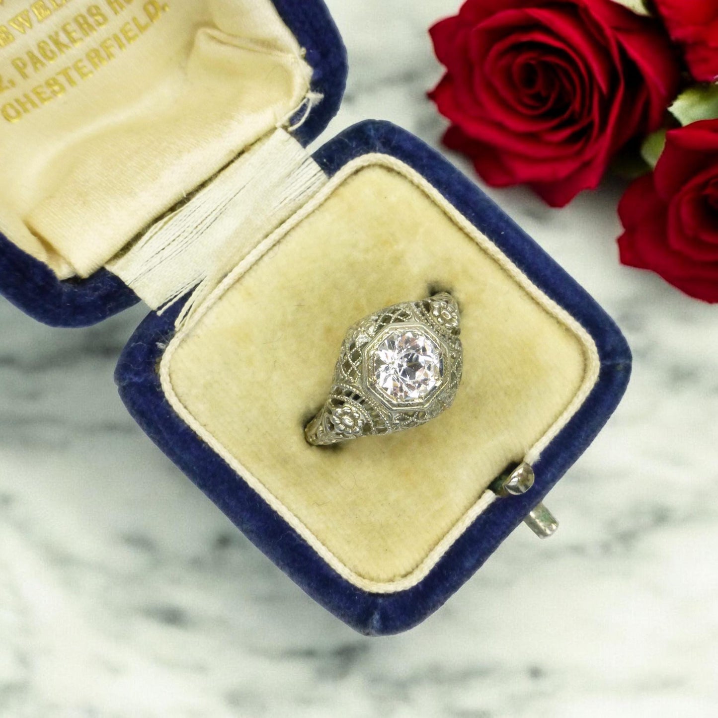 Antique white gold filigree and white sapphire solitaire ring c1900's