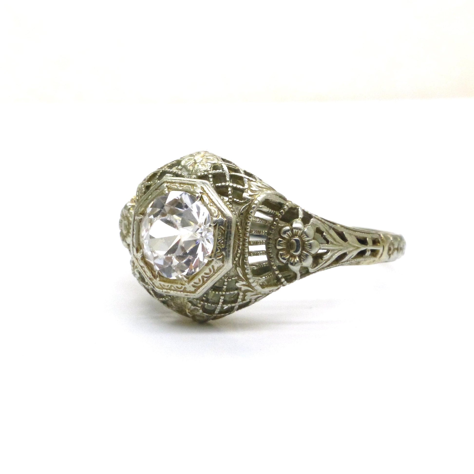 Antique white gold filigree and white sapphire solitaire ring c1900's