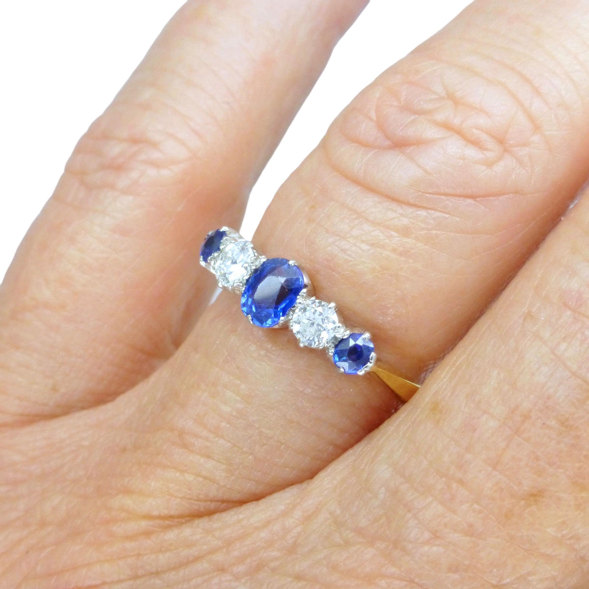 Antique 18ct Platinum Cornflower blue Sapphire & Diamond five stone ring