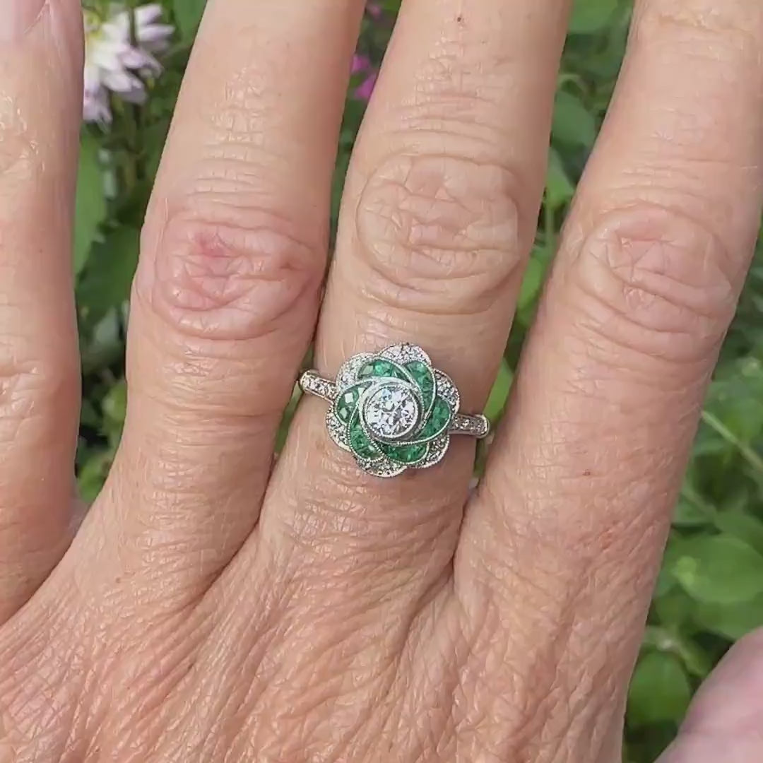 Art Deco style Platinum Emerald & Diamond flower cluster halo ring